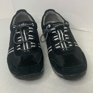 Dansko Helen sneakers in black with white trim